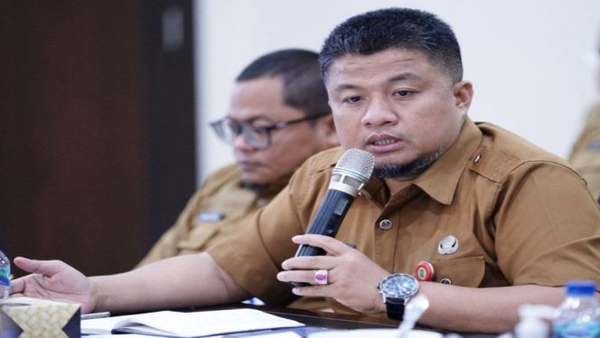 
 ? Kadisnakertrans Riau, Imron Rosyadi.
