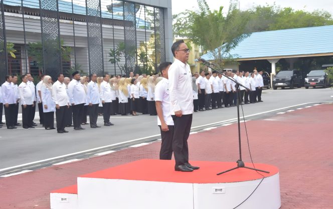 
 📸 Sekda Bengkalis, dr. Ersan Saputra Pimpin Apel Perdana Pasca Idul Fitri 1446 H.