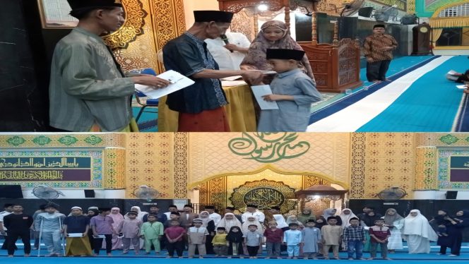 
 📸 Penyerahan santunan anak yatim oleh pengurus Masjid Al-Mubarak di Desa Senggoro, Kecamatan Bengkalis, menjelang Idul Fitri 1447 H.