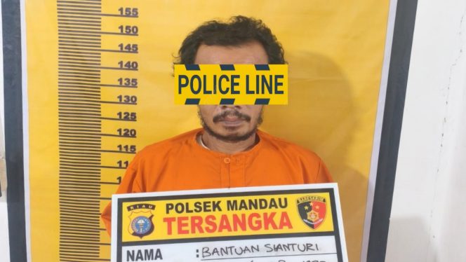 
 📸 Tersangka kasus persetubuhan anak diamankan di Polsek Mandau Bengkalis.
